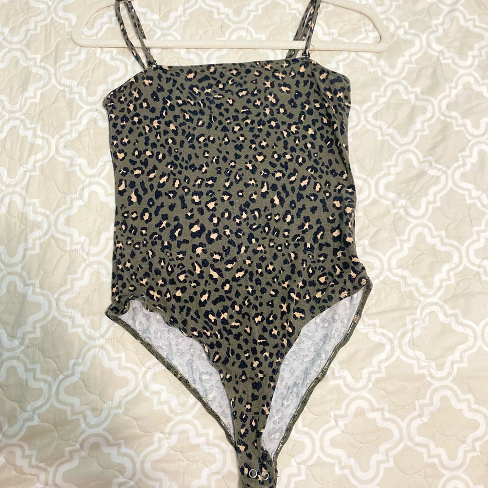 Bodysuit verde con estampado 💚✨